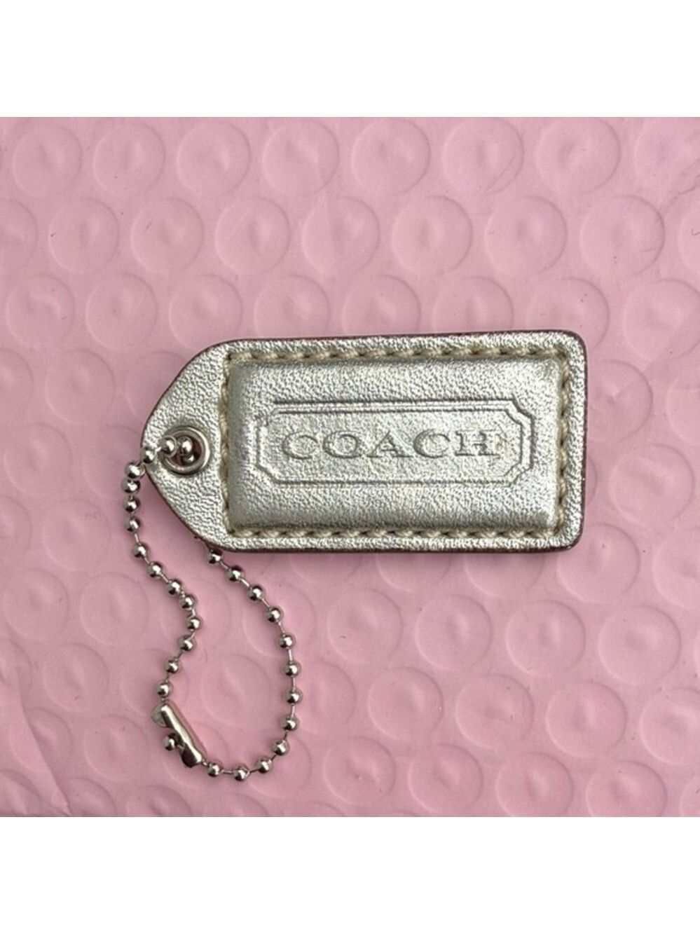 Coach Shimmering Silver Tag Keychain Coach Hangtag Coach bag accessories